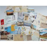 A box of cigarette cards and postcards, some in an album, includes QEII, BOAC etc