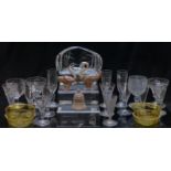 Sixteen 18thC and later clear glass drinking glasses together with a pair of amber glass bowls and