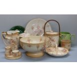 A large collection of Crown Devon ceramics including teapots and biscuit barrel, approximately 25