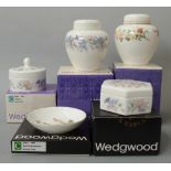 Collection of boxed Wedgwood ceramics including trinket boxes, covered vases etc