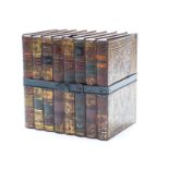 Huntley & Palmer biscuit tin shaped as a row of eight vintage books