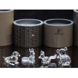 Four Swarovski cut glass animals comprising two dogs, koala and a fox