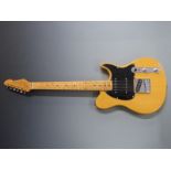 Peavey Generation EXP electric lead / rhythm guitar in golden blonde finish with black scratch