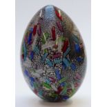 Murano 20thC glass egg decorated with murrine canes and silver leaf over a black ground, all cased