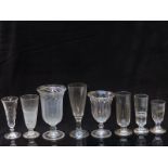 Eight 19thC and later clear glass vases or large goblets, some with cut decoration and one of