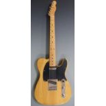 Fender style unbadged electric lead / rhythm guitar in pine finish with black scratch plate,