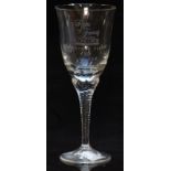 A clear glass wine glass with bowl engraved Flights of Fantasy Goodwood Concorde Christmas Flight To
