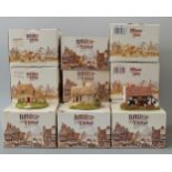 Twelve Lilliput Lane models in boxes