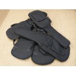 Five padded soft guitar carry cases.