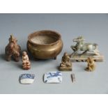 Oriental brass censer, carved soapstone figures, brass figure and two pottery fragments