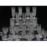 Twenty seven pressed glass vases, goblets and ornaments.