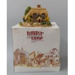 Four Lilliput Lane models in boxes