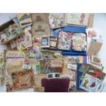 A large collection of cigarette, trade, cards and stamps both loose and in albums