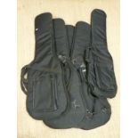 Five padded soft guitar carry cases.