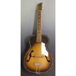 Valencia cello fronted acoustic guitar fitted with six steel strings