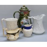 An ironstone jug, 19thC relief moulded jugs etc, height of tallest 24.5cm