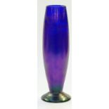 An iridescent blue glass pedestal vase with remnants of gilt decoration, 32cm tall