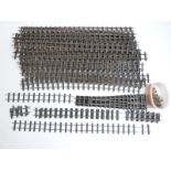 Thirty-one long lengths of 32mm gauge garden railway track, five sets of points and further