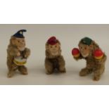 A set of three M Toys of West German clockwork mohair covered tinplate monkeys, all in the form of a