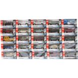 Twenty-five Cararama diecast model vehicles including recovery lorries, Land Rovers etc, all in
