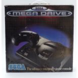 Sega Mega Drive video games console, in original box.