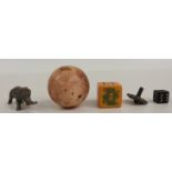 A late 19th/20thC ivory ball, elephant figure dice etc, the ball 32.1mm diameter, weight 33g