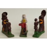 Three novelty cast metal mechanical money boxes two with a man shooting a bear in a tree and one