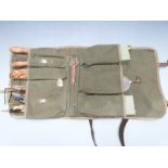 Russian machine gun cleaning kit including bottles, spanners, parts etc in a canvas and leather