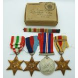 WWII medals comprising 1939/45 Star, Africa Star, Italy Star and War Medal with bar for 1st Army, in