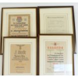 Four German WWII Third Reich Nazi style framed certificates including a youth example