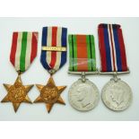British Army WWII medals comprising the France & Germany Star with Atlantic clasp, the Italy Star,