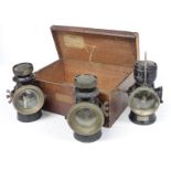 A set of three Lucas King's own veteran or early motor car oil lamps, two being F141 front lamps the