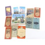 Nine vintage motoring and similar mainly linen backed maps and a Victory wooden jigsaw puzzle of