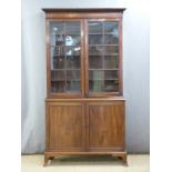 19thc glazed bookcase/cabinet with adjustable shelving raised or splayed bracket feet, W106 x D36