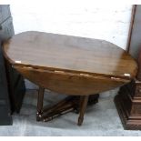 Stained pine extendable dining table with five leaves and additional legs, collapsed size L min 119