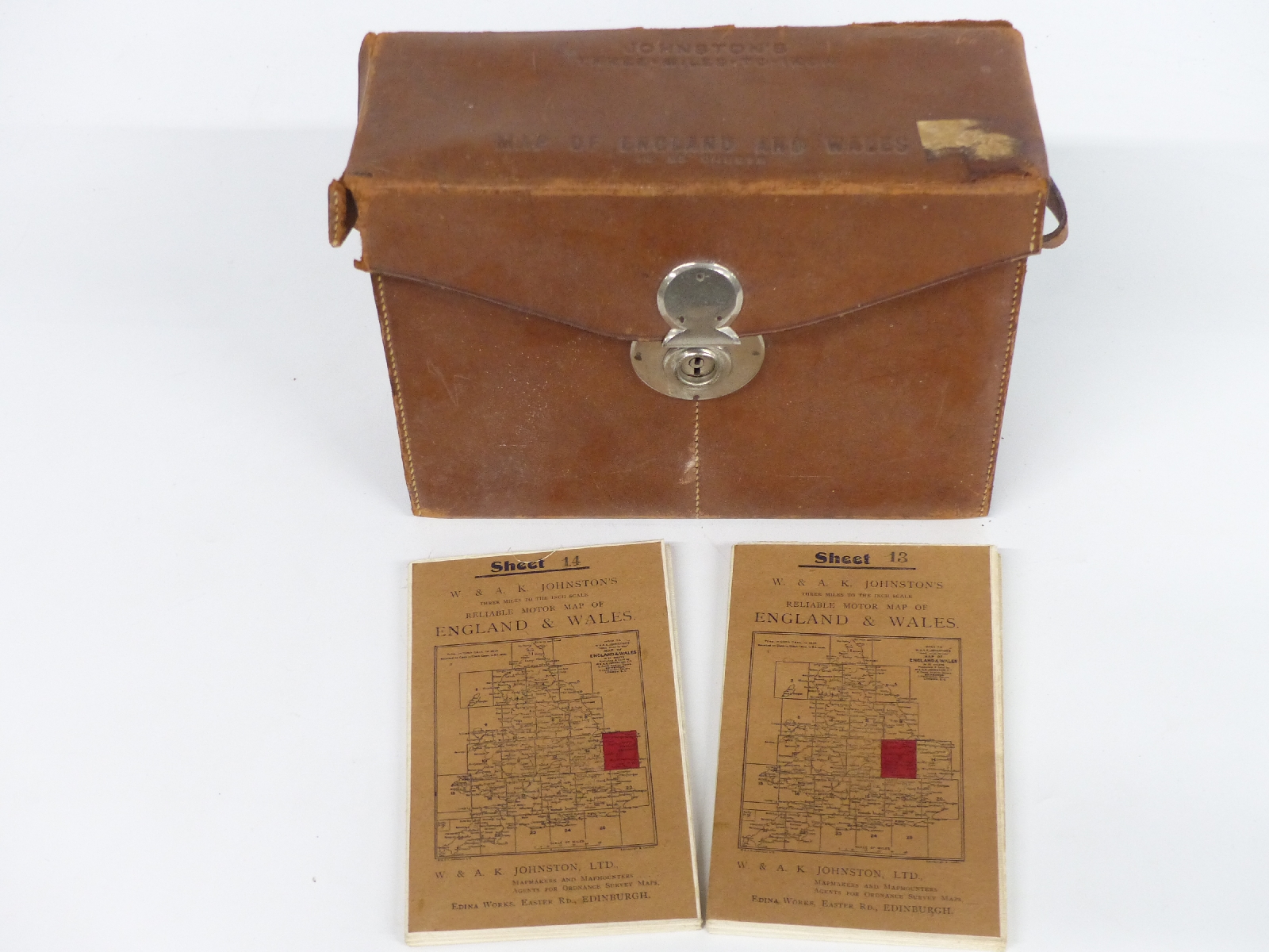 A leather cased set of 25 motor maps of England and Wales by W & AK Johnston, three miles to the