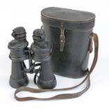 WWII German navy binoculars 7x50 and marked Geh, with case stamped with Nazi symbol and M