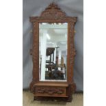 Carved oak hall mirror with bevelled glass and integral glove box. W49 x H106cm