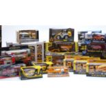 Twenty-seven model construction and emergency vehicles and vehicle sets including JCB, London Series