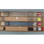 Four boxes of Longshot archery arrows, one set of four, three sets of seven