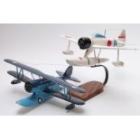 Two wooden model aeroplanes, one Naka Jima A6MZ-N on wooden base with name plaque, largest 40cm