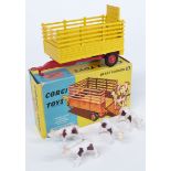 Corgi Toys diecast model Beast Carrier with yellow body, red chassis and hubs and four cows 58, in