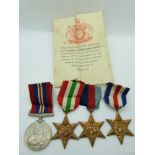 Royal Navy WWII medals comprising 1939-1945 Star, France & Germany Star, Italy Star and War Medal,