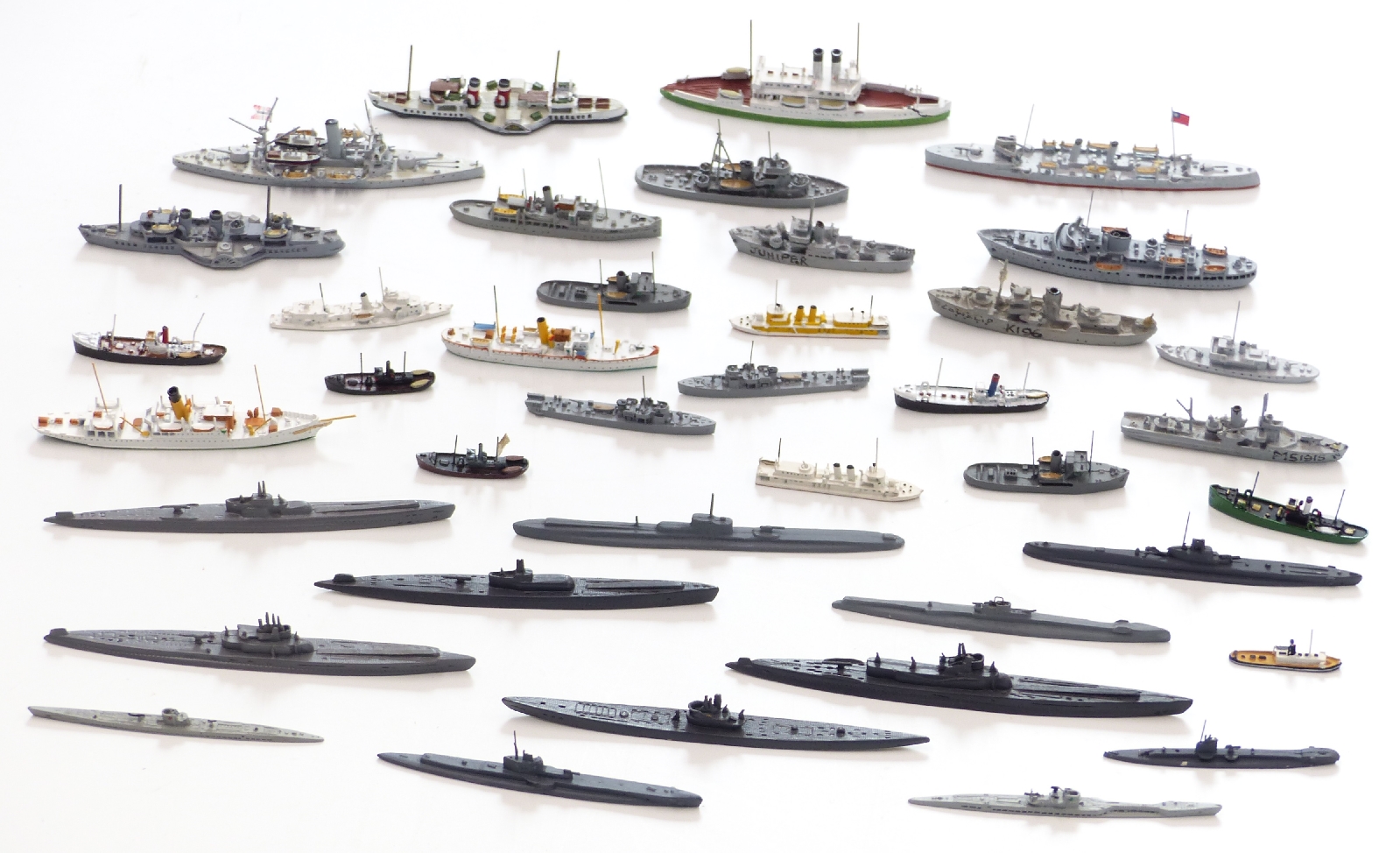 Thirty-nine Neptun and similar diecast model waterline ships including military and merchant,