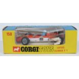 Corgi Toys diecast model Lotus Climax F/1 with two-tone orange and white body and racing number 8