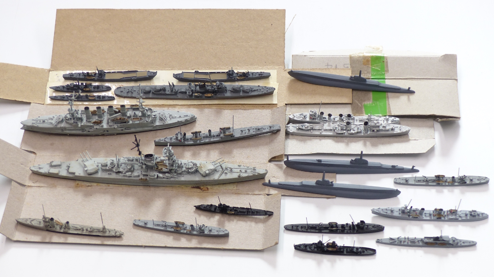 Twenty-one Neptun and similar diecast model waterline ships including Argonaut, Scharnhorst etc,