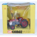 Corgi Toys diecast model Massey-Ferguson '165' Tractor With Saw Attachment with red body and hubs