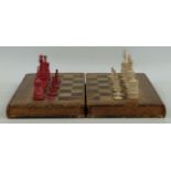 A 19th century turned and carved bone chess set, height of tallest piece 10cm, all but one pawn