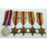 WWII British medals comprising four Africa Stars with clasps for 1st Army, 8th Army and North Africa