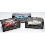 Three Burago and ERTL 1:18 scale diecast model vehicles comprising American Muscle 1957 Chevy Bel